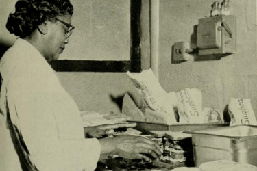 Black woman making sandwiches