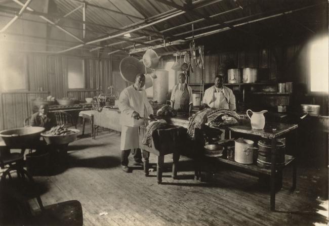 black and white photograph of Charlie Dory and kitchen staff, Maryland Agricultural College, c. 1912; (left to right: Bill Dory; Ferdinand Hughes; Spencer Dory; Charlie Dory)
