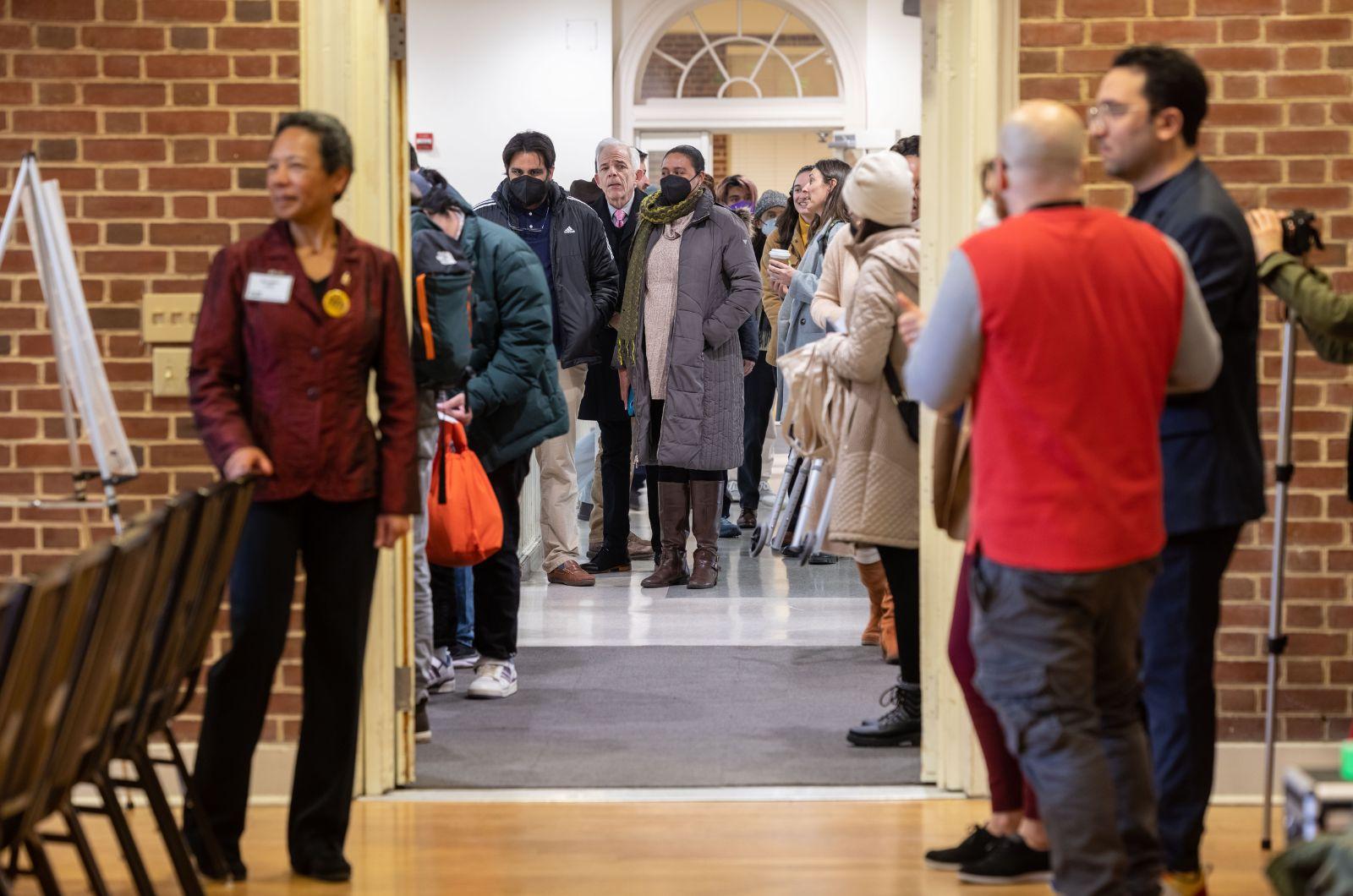 attendees in line to get into The 1856 Project Inaugural Symposium 