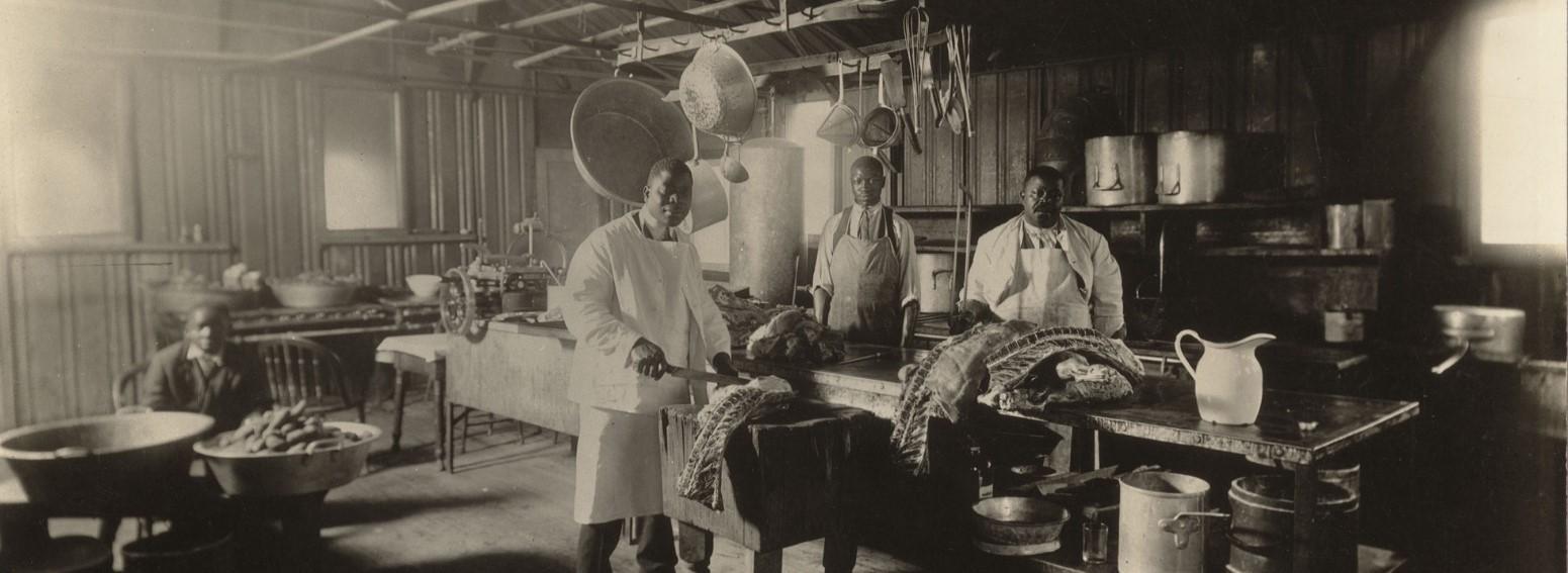 Bill Dory, Ferdinand Hughes, Spencer Dory, & Charlie Dory in the kitchen c. 1912