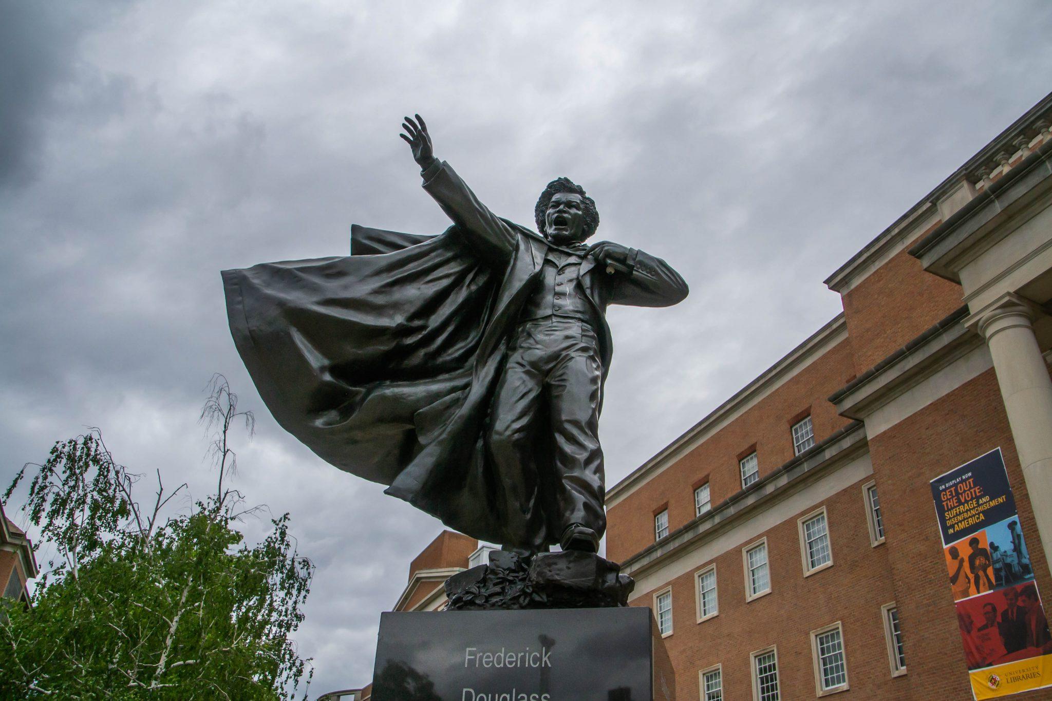 worm's eye view of the Frederick Douglass statue in front of Hornbake Library on UMD's College Park campus